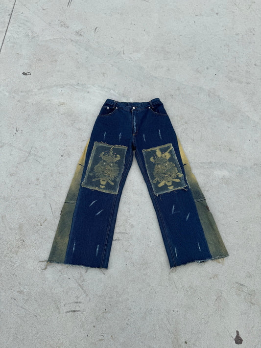 BuyMoor Essential denim jean Street Luxury Edition this is a unique 1 of 1 pair of upcycled denim jeans with decorative patches featuring ornate designs.