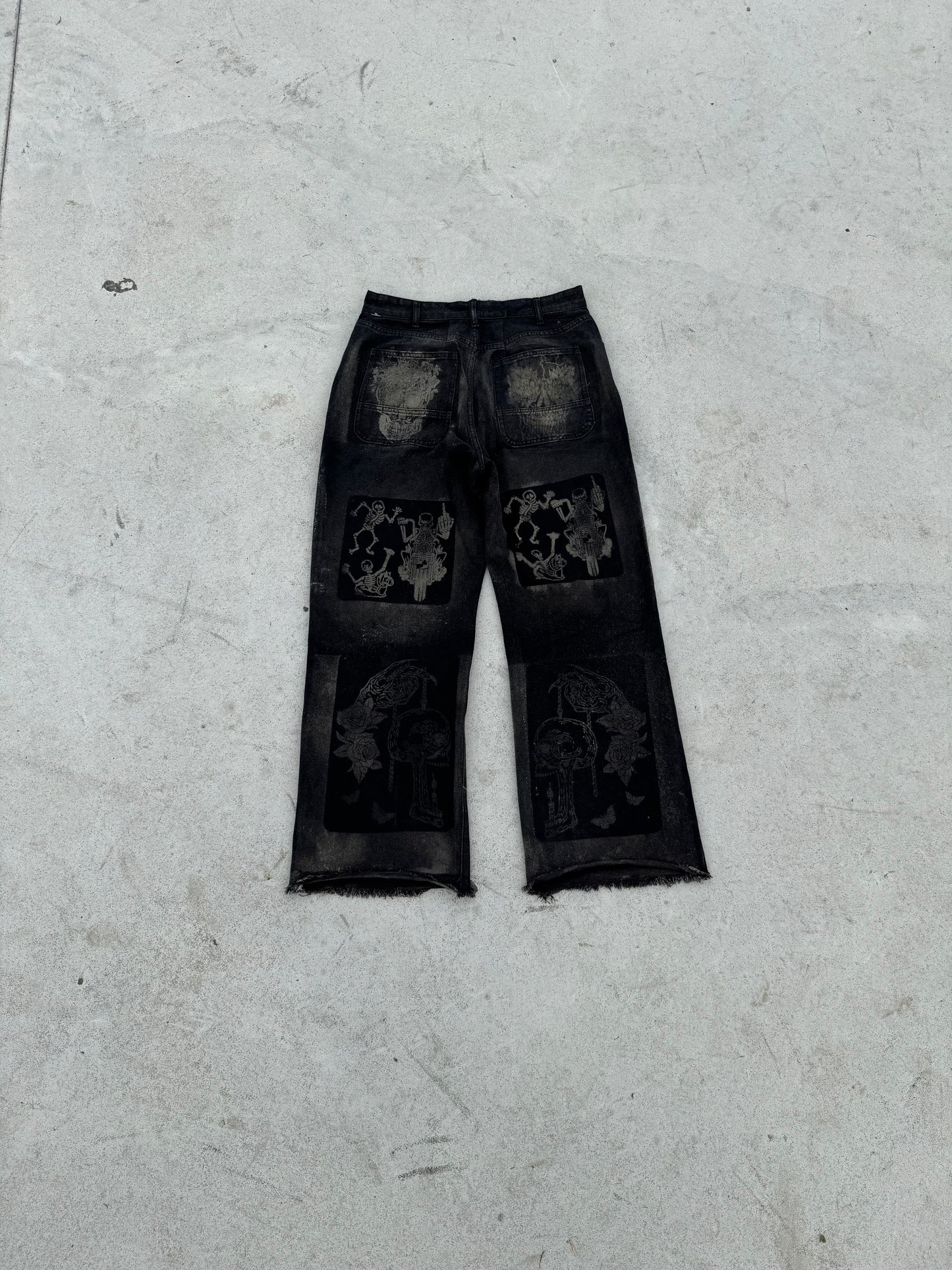 BuyMoor Essential denim jean Street Luxury Edition this is a unique 1 of 1 pair of upcycled denim jeans with decorative patches featuring ornate designs.
