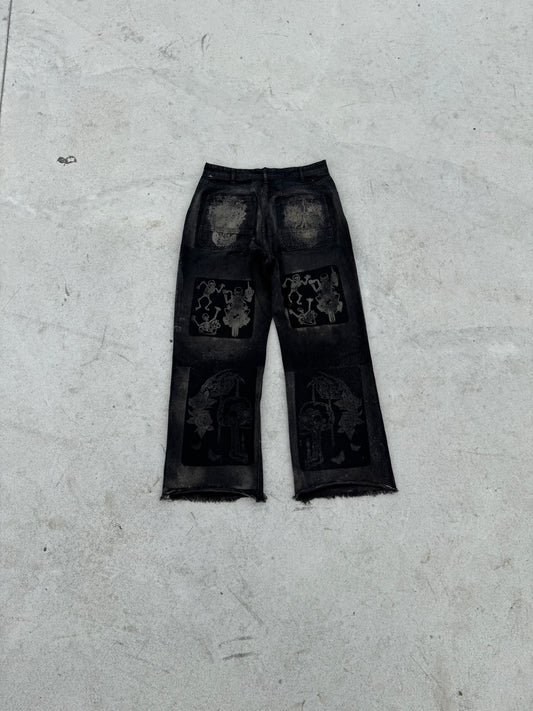 BuyMoor Essential denim jean Street Luxury Edition this is a unique 1 of 1 pair of upcycled denim jeans with decorative patches featuring ornate designs.